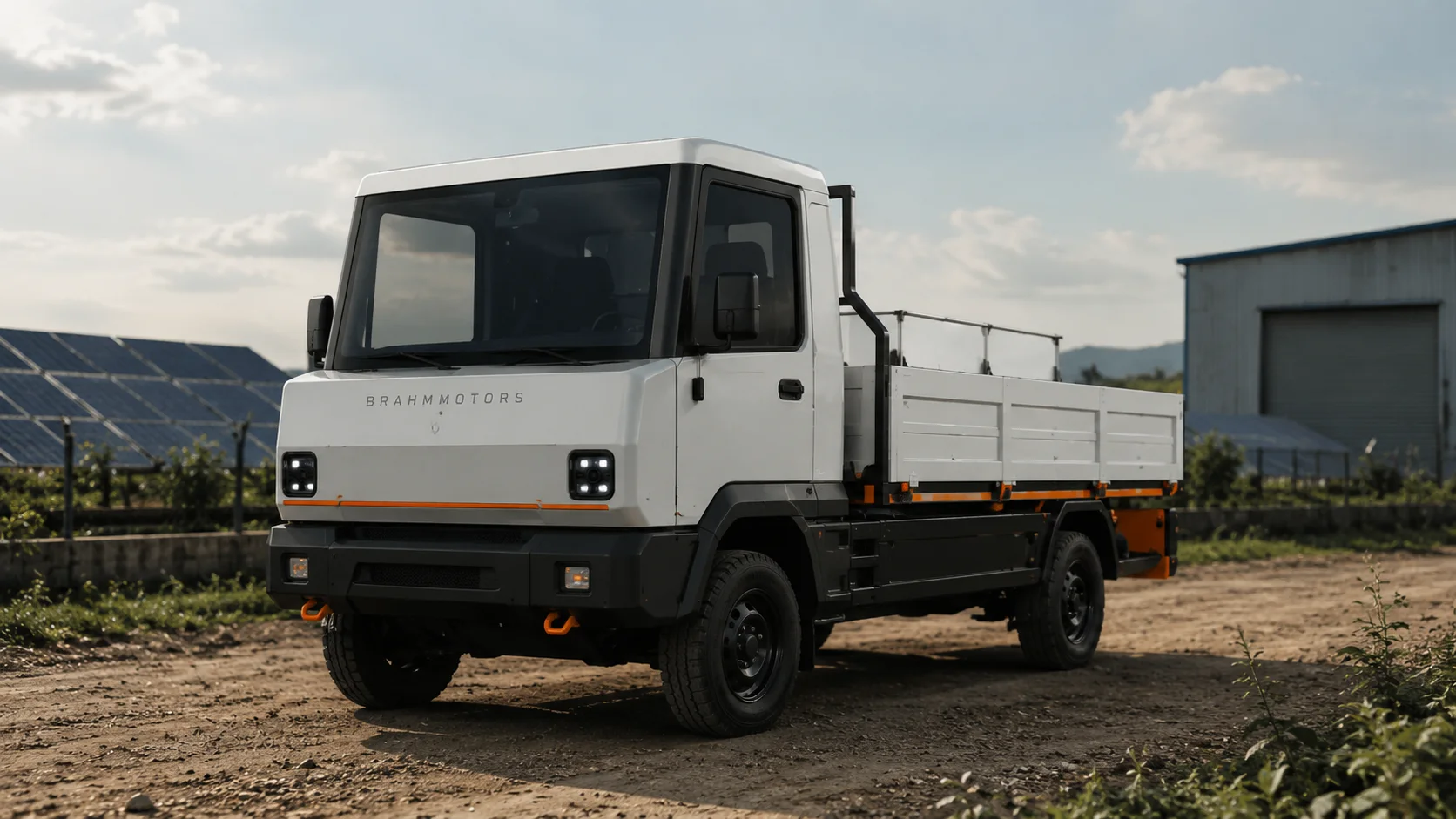 BrahmMotors electric work truck at an industrial solar facility